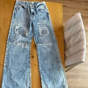 Distressed Light Blue Flare Jeans